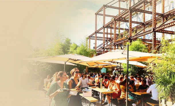 A busy outdoor meanwhile-use food and drink venue